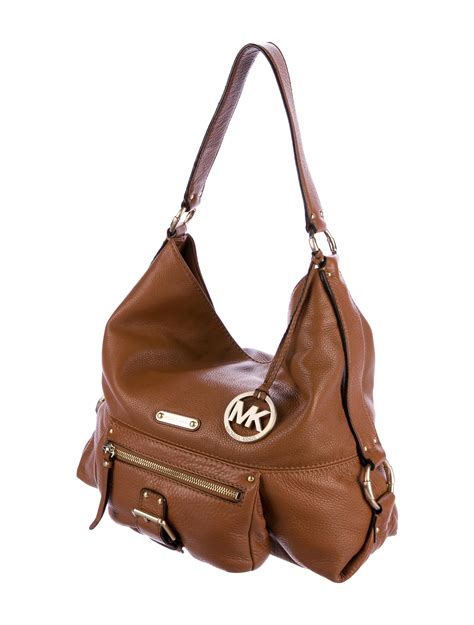 michael kors leather beige bag|Michael Kors leather bags real.